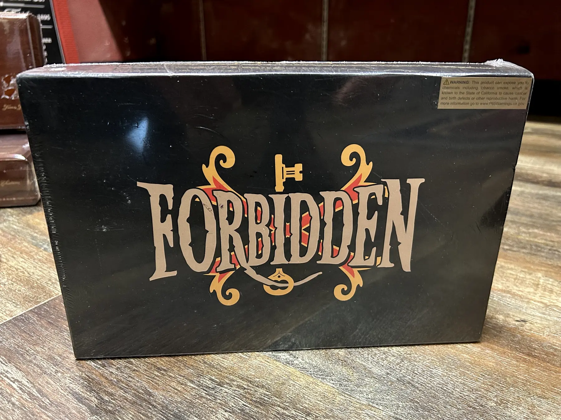 A box of Forbidden cigars