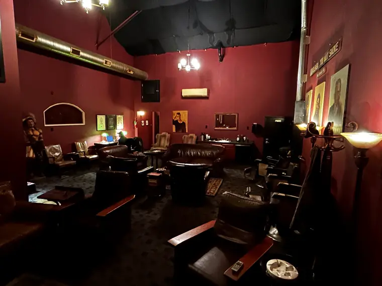 Leather armchairs and low light